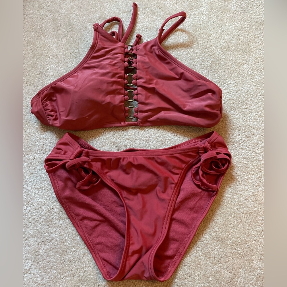 I am selling this bathing suit set from target. They are both a size small